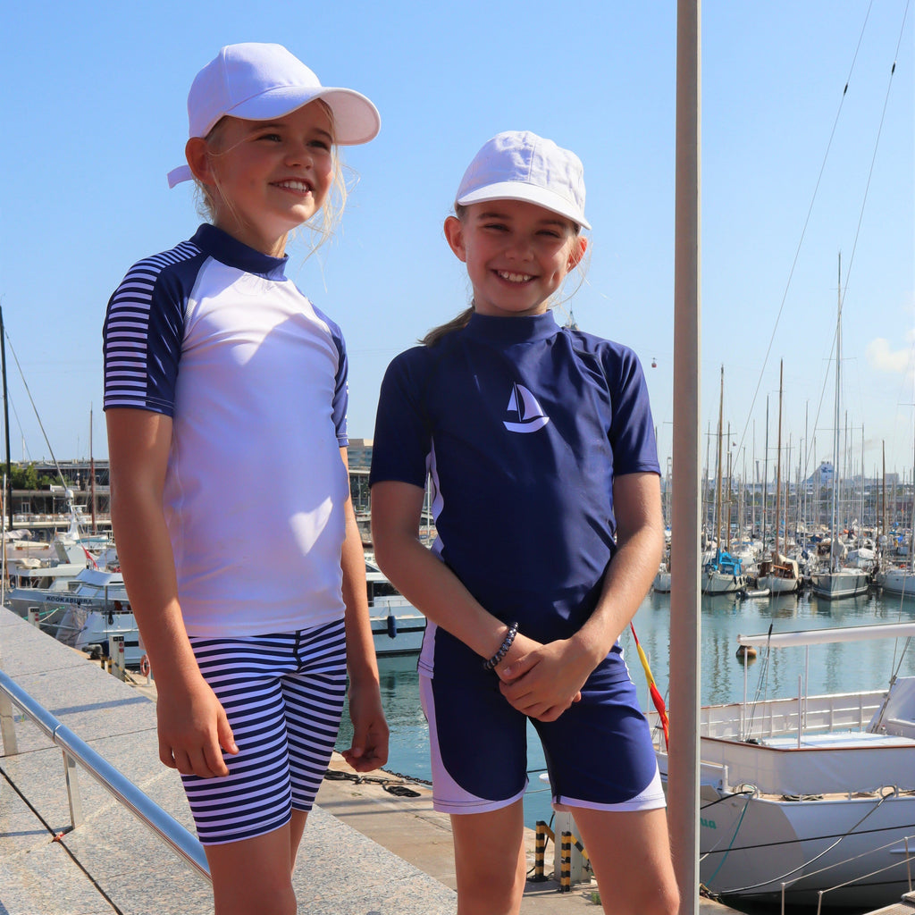 Sea Breeze White Sailboat Print on Kids Navy Short Sleeve Rash Vest