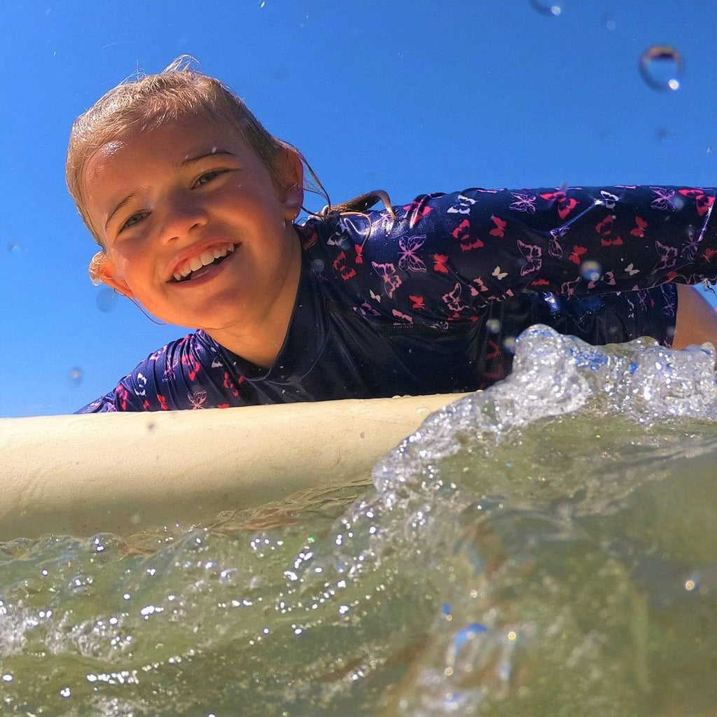 Beach Butterfly Kids butterfly Print Long Sleeve Rash Vest pink and indigo Ages 4-11 years - Jody and Lara