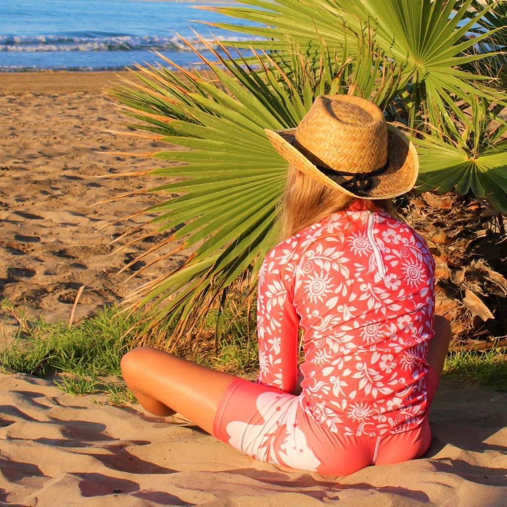California Sunshine Kids Coral Swim shorts with large white floral print Age 4-11yrs - Jody and Lara