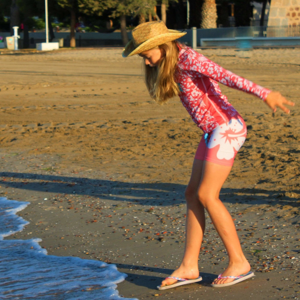 California Sunshine Kids Coral Swim shorts with large white floral print Age 4-11yrs - Jody and Lara