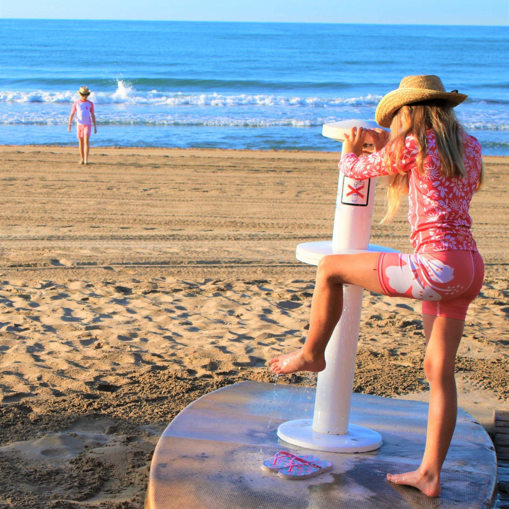 California Sunshine Kids Coral Swim shorts with large white floral print Age 4-11yrs - Jody and Lara