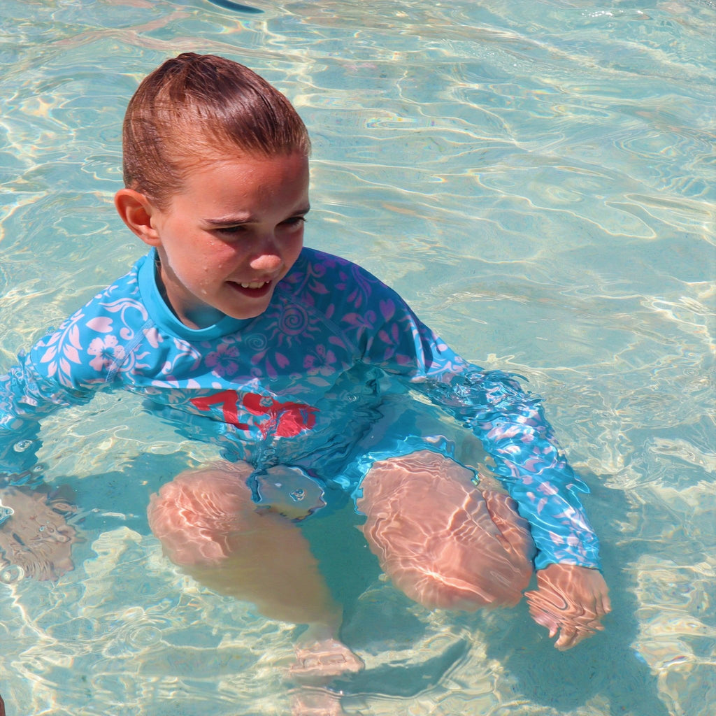 California Sunshine Turquoise and White Floral printed Kids Long Sleeve Rash Vest Age 4-11yrs - Jody and Lara