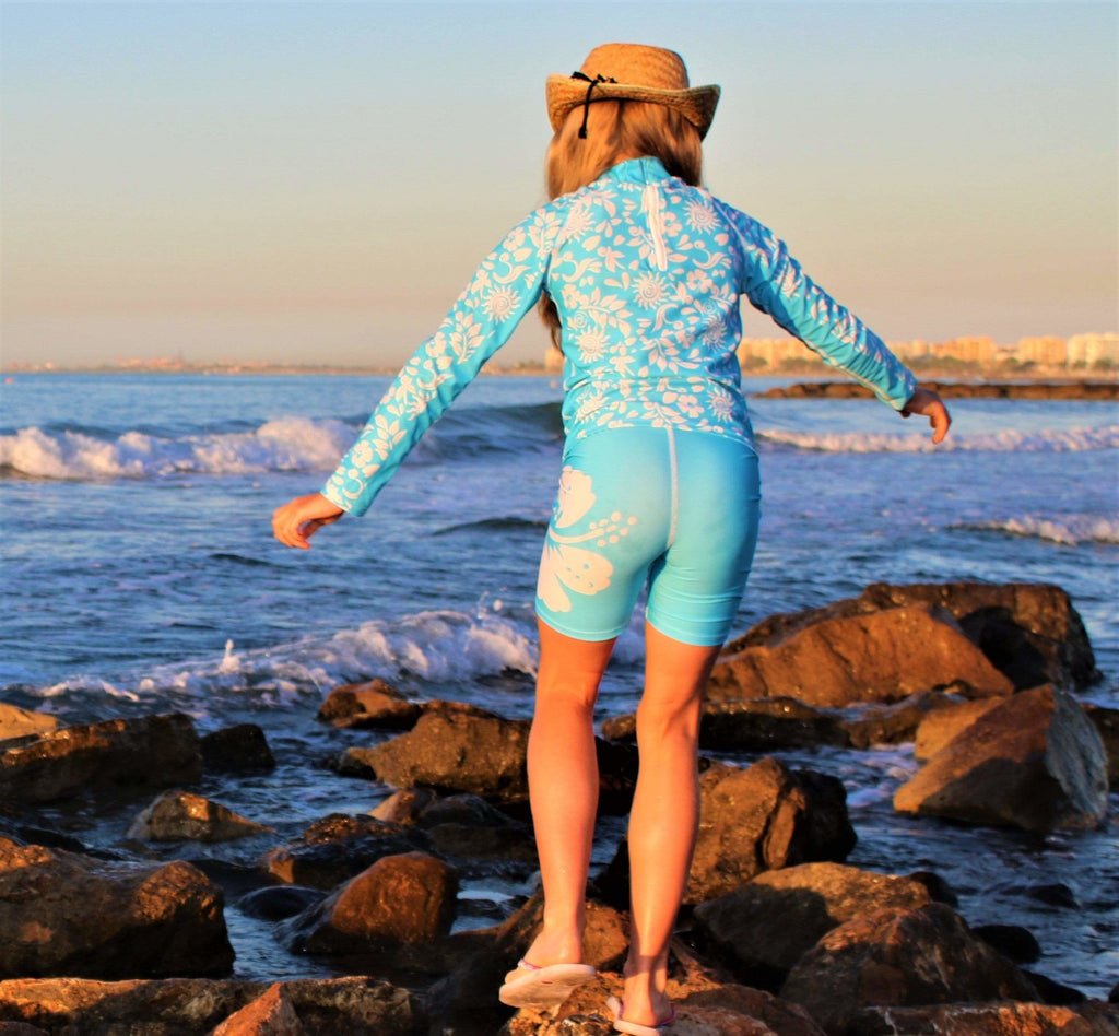 California Sunshine Turquoise Kids Swim Shorts with large white floral print Age 4-11yrs - Jody and Lara