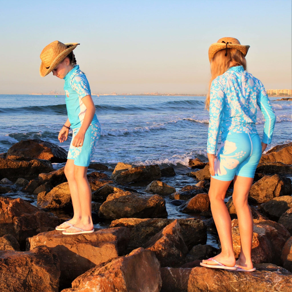 California Sunshine Turquoise Kids Swim Shorts with large white floral print Age 4-11yrs - Jody and Lara