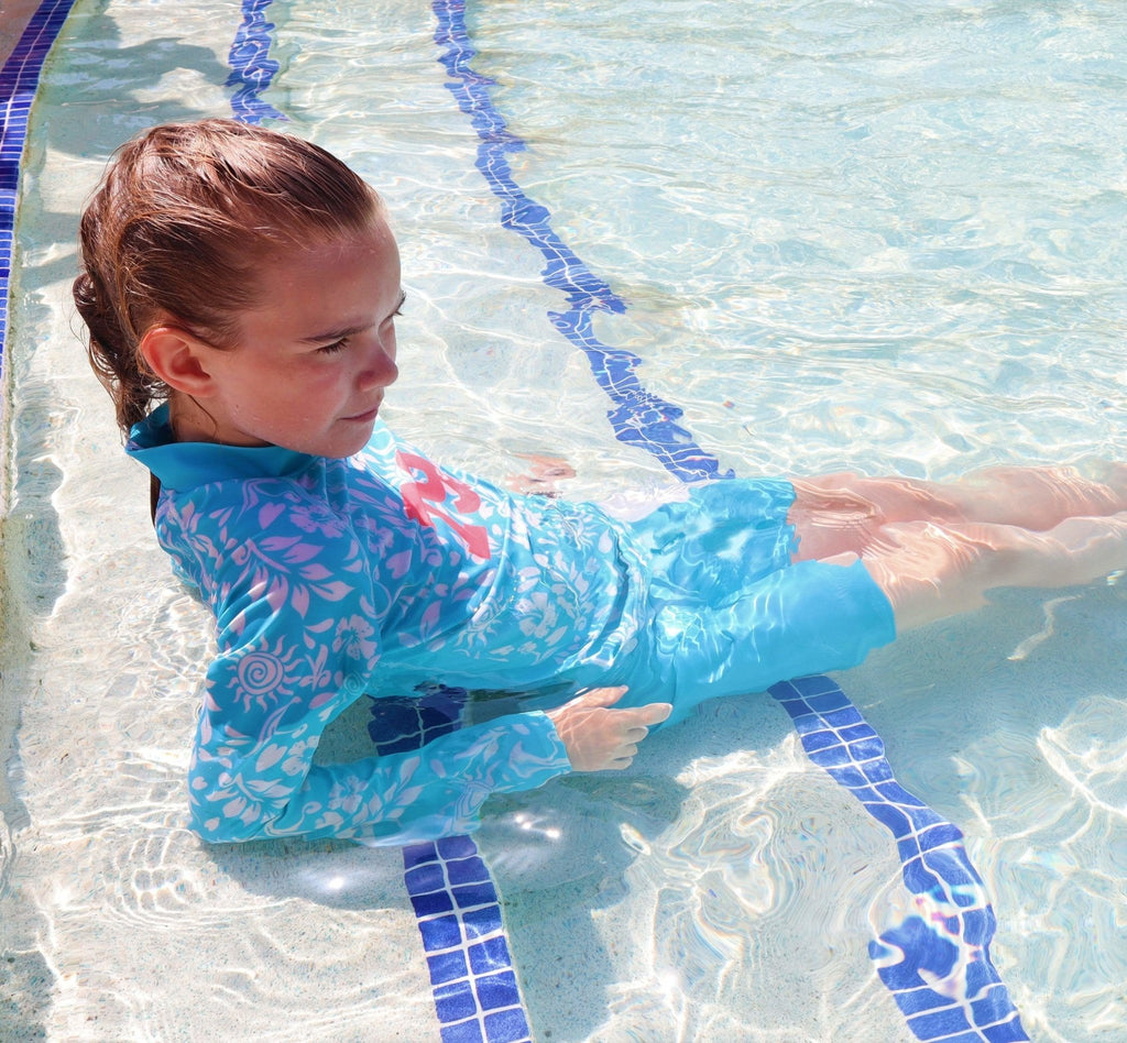 California Sunshine Turquoise Kids Swim Shorts with large white floral print Age 4-11yrs - Jody and Lara